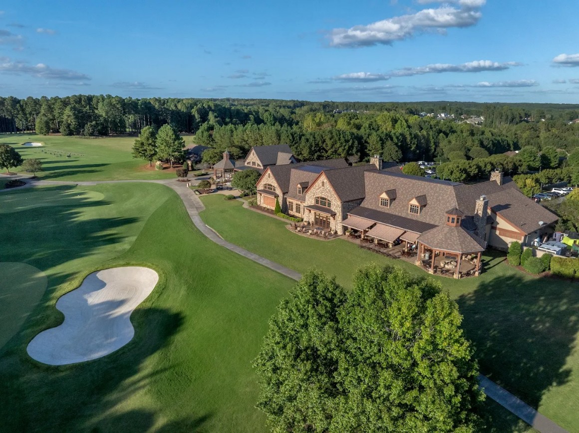 Aerial view of the Hasentree clubhouse overlooking the golf course
